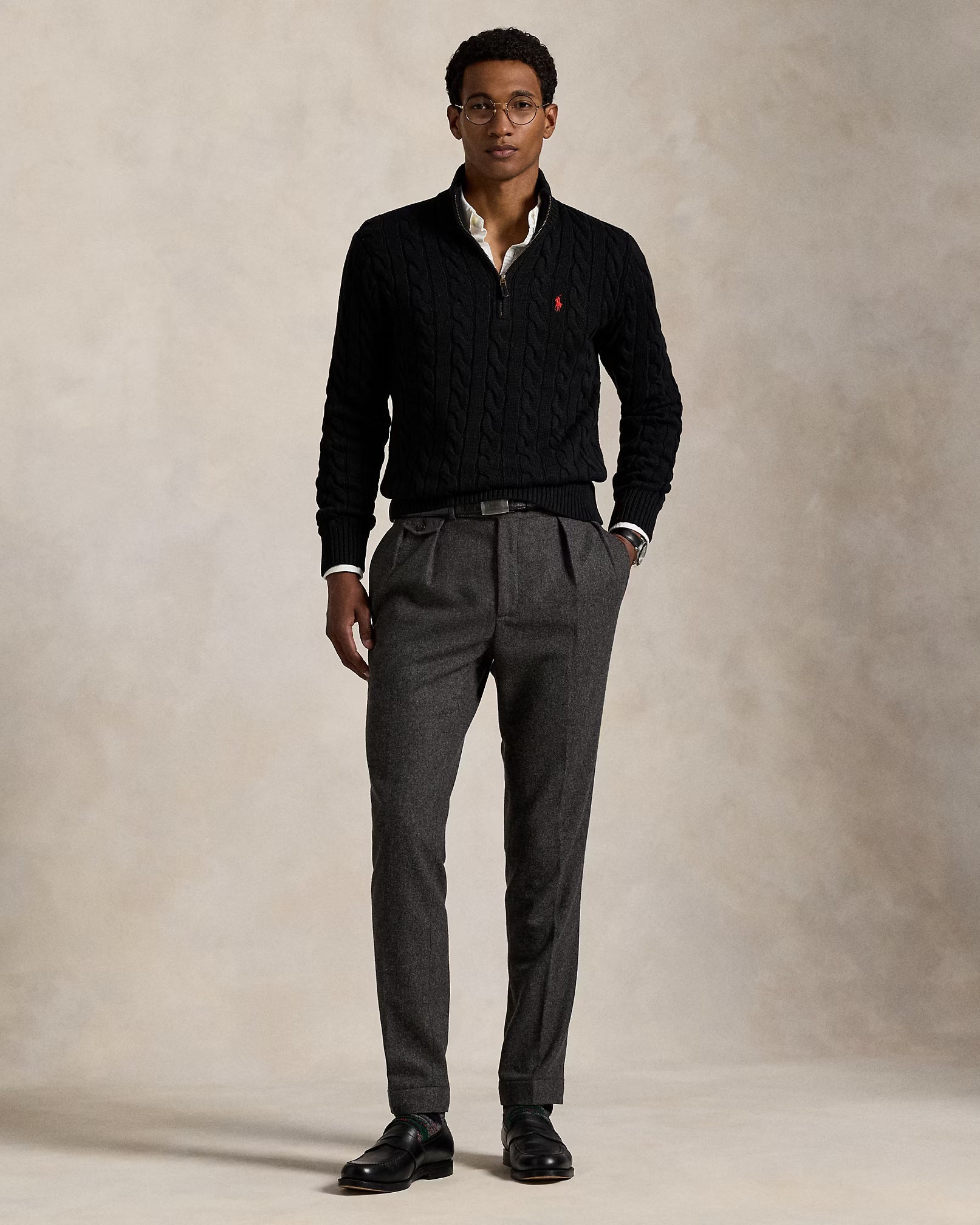 Kortærmet bomuldsstrik med lynlås op til brystet